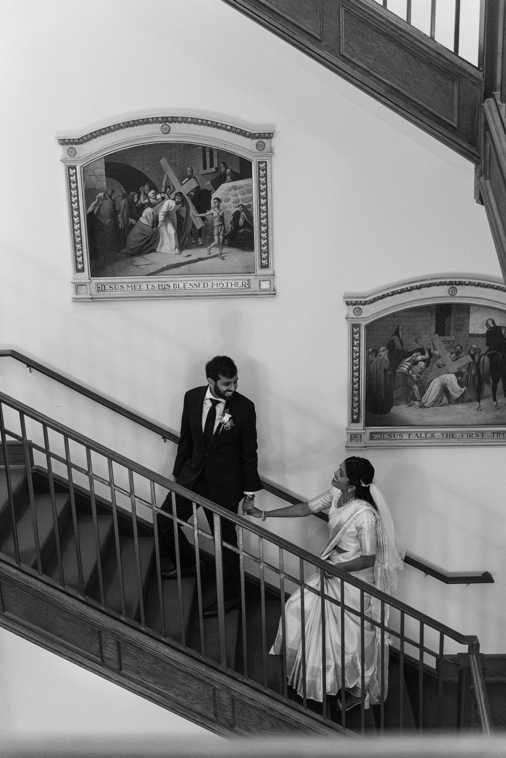 A sequence of black and white photographs showing a couple descending a staircase in formal wedding attire.