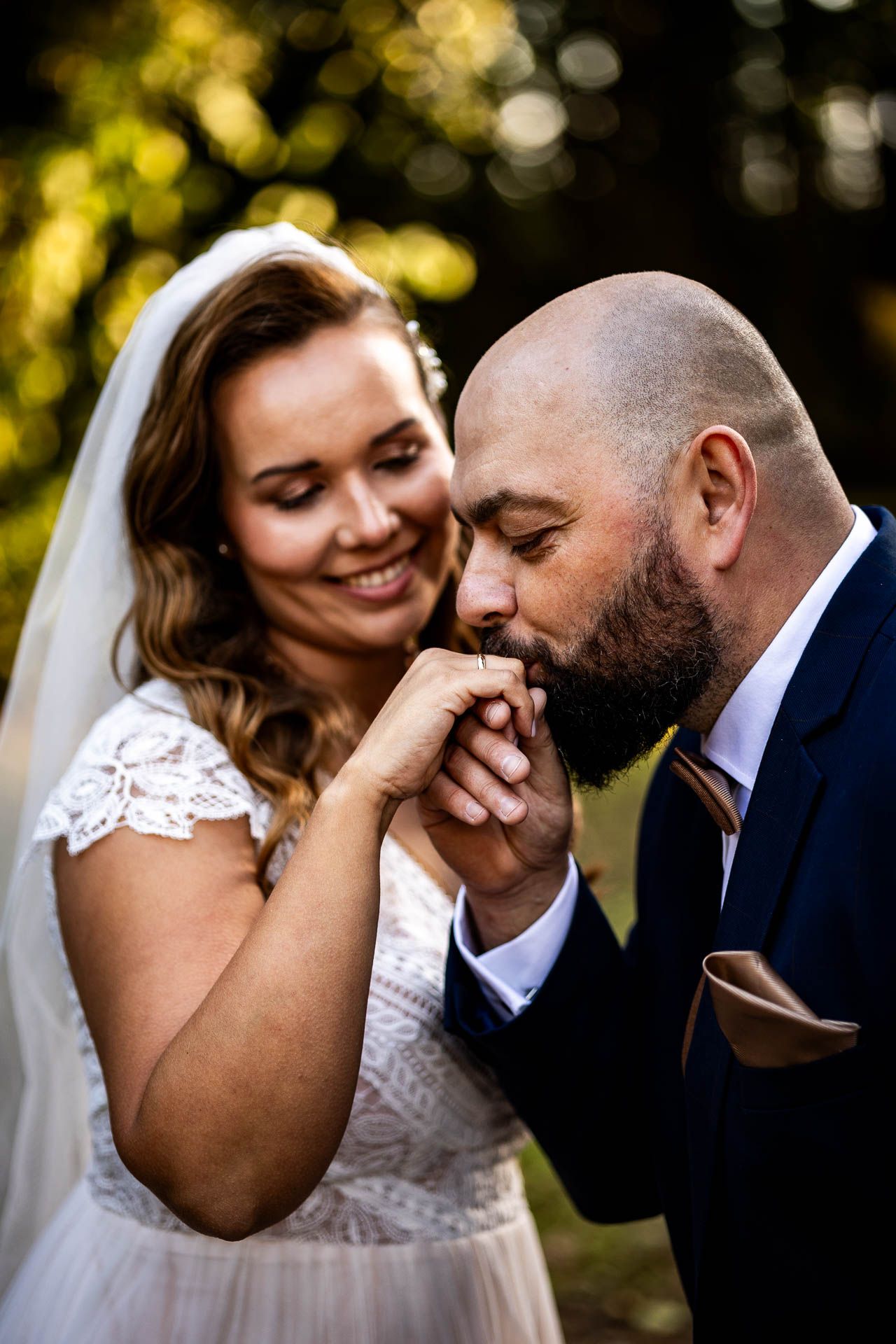 A romantic wedding photo sequence showing tender moments between newlyweds in a sunlit outdoor setting.
