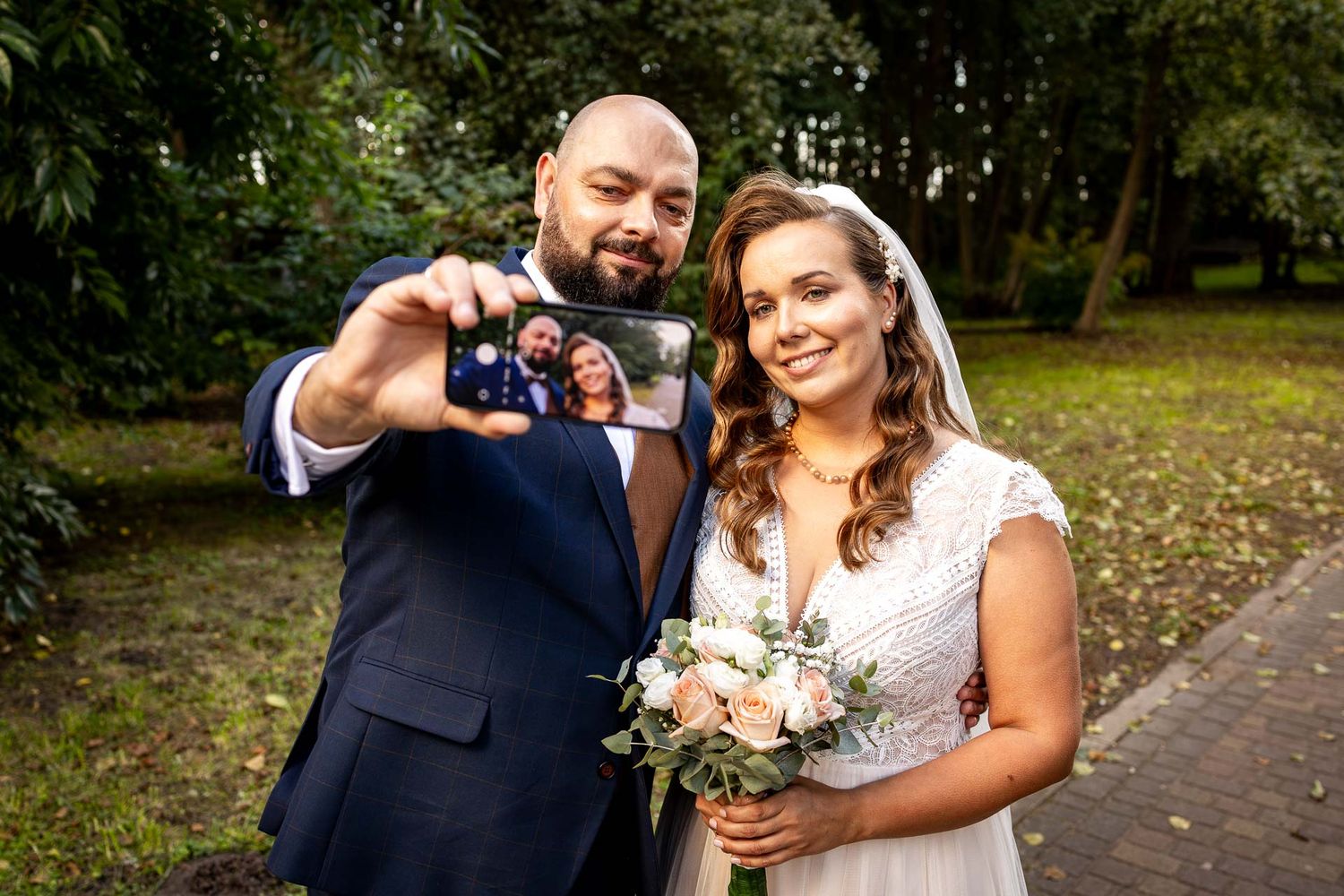 Candid wedding photography sequence showing joyful moments between newlyweds on a path.
