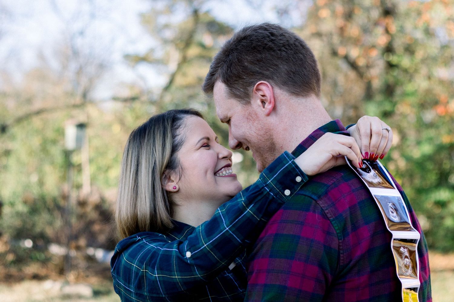 couple hugging with ultrasound photo