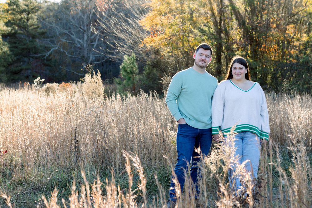 couple standing in field