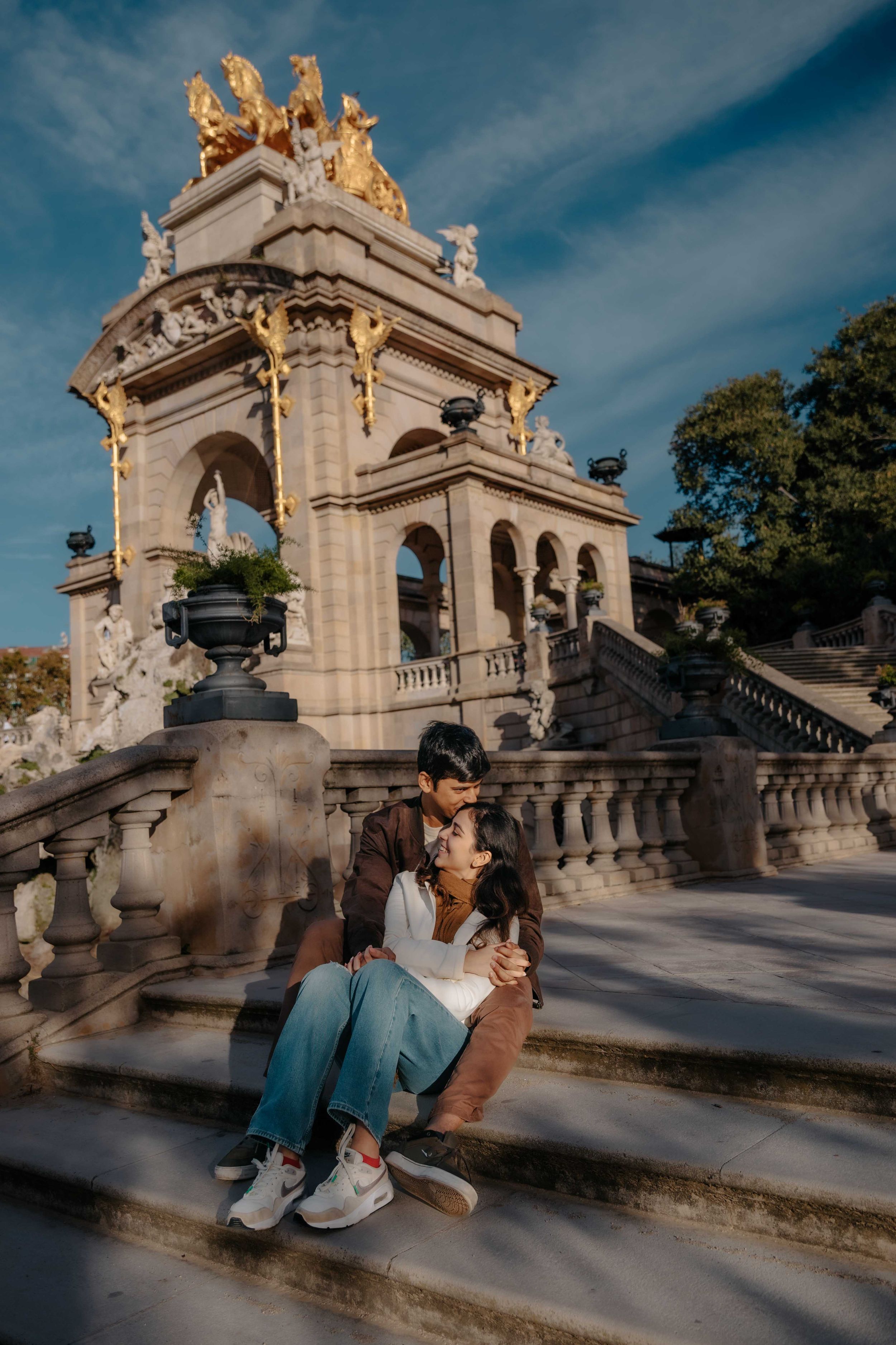 Intimate proposal moment under the trees in Ciutadella Park