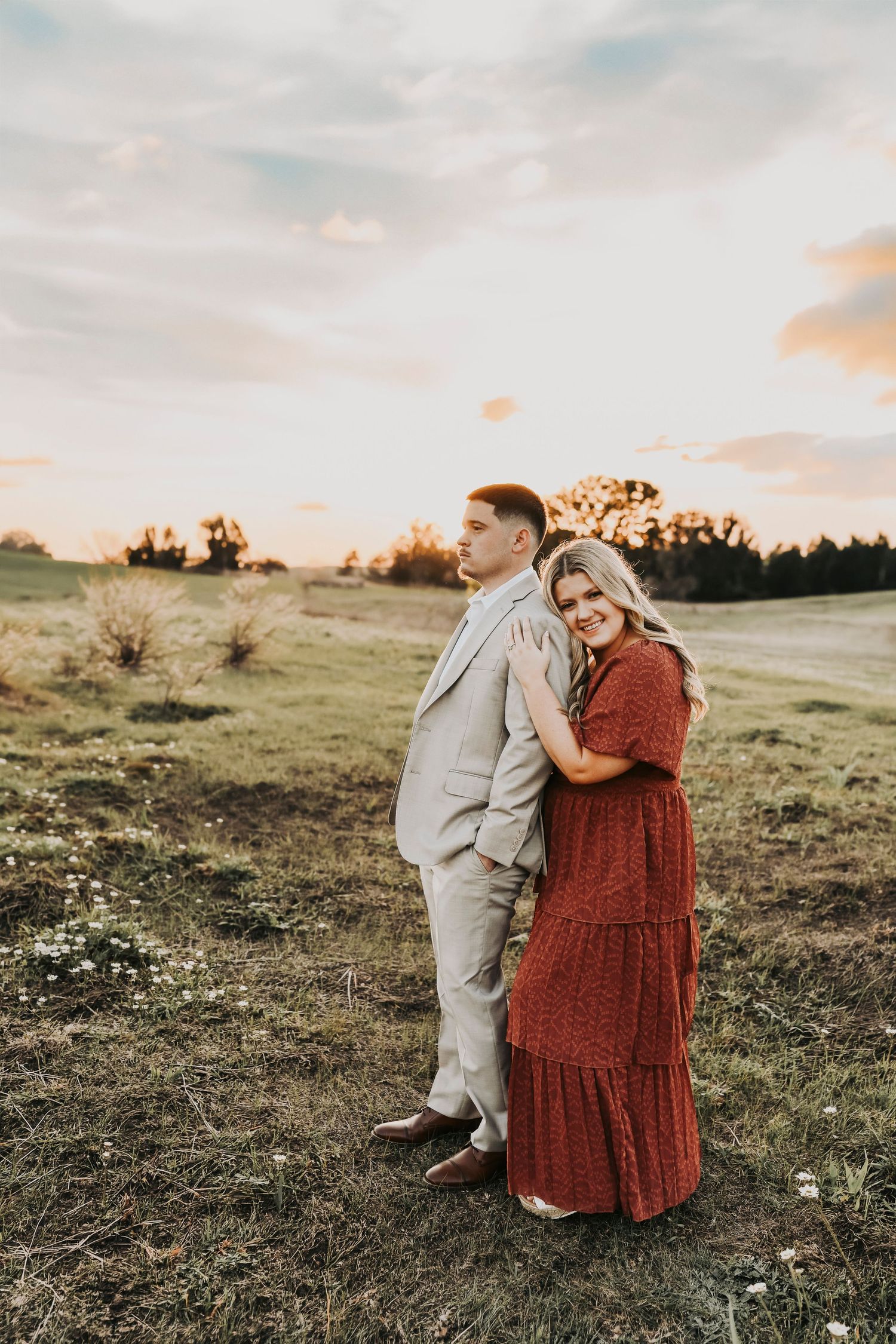 Couple laughing during outdoor engagement session Flower Mound Texas.