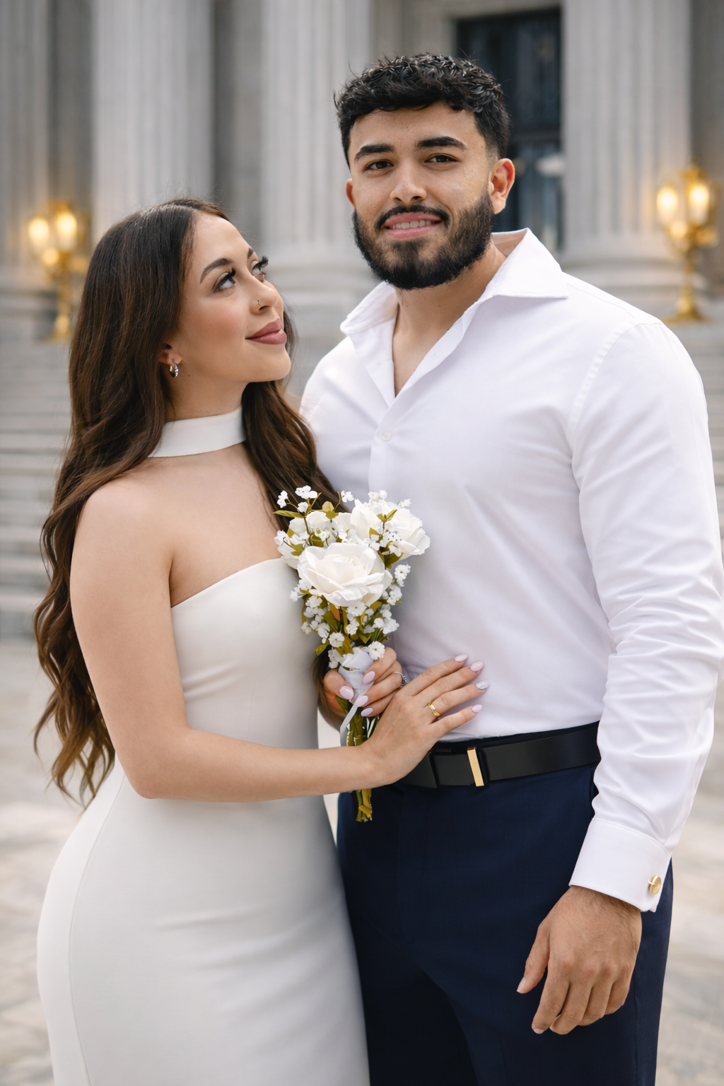 A romantic wedding photoshoot series showing a couple in white and navy attire with a white floral bouquet.