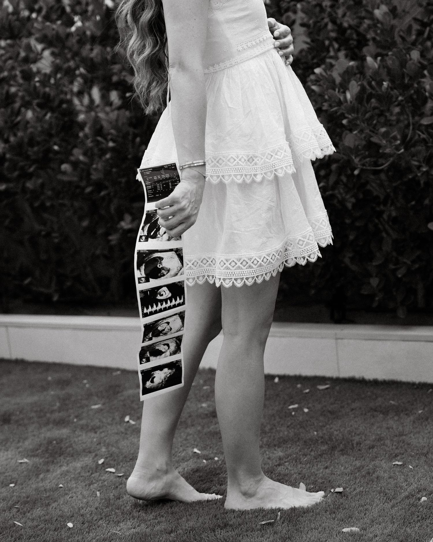 Black and white maternity photoshoot in Dubai showing baby bump silhouette