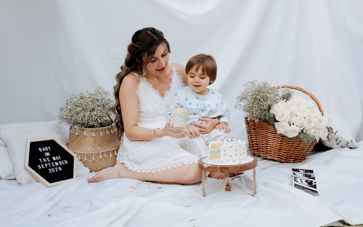 Mother and child indoor maternity photoshoot Dubai with cozy minimal setup