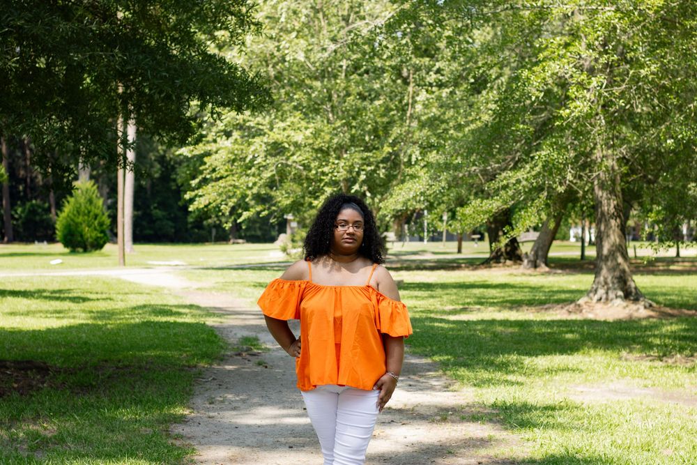 Eastern North Carolina Portrait Photographer specializing in solos, families, milestones, and mini sessions with true-to-life color.