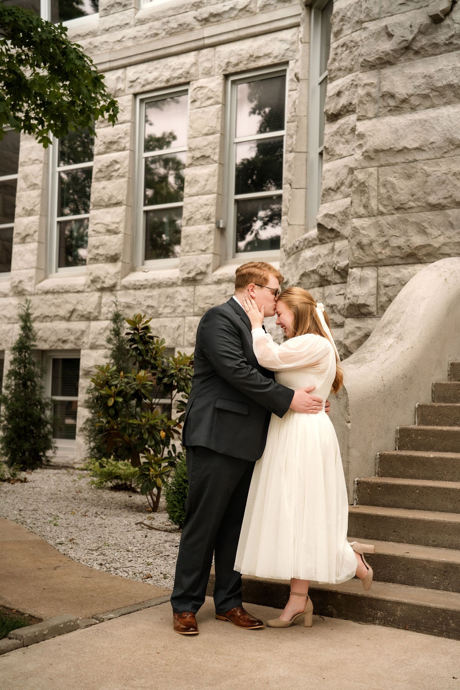elegant, sophisticated downtown editorial-style engagement session at historic Carthage square in Carthage MO