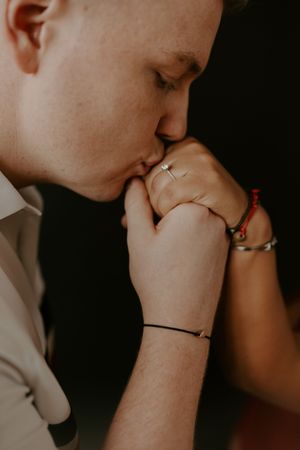 Close-up intimate portrait showing tender moment between couple.
