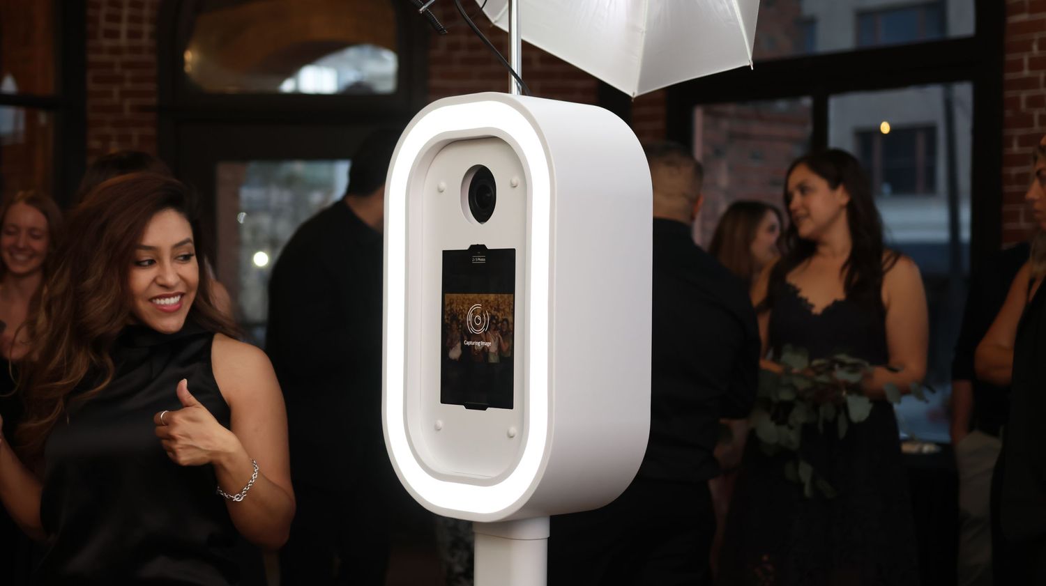 Close-up of a high-resolution DSLR camera in an elegant photo booth setup