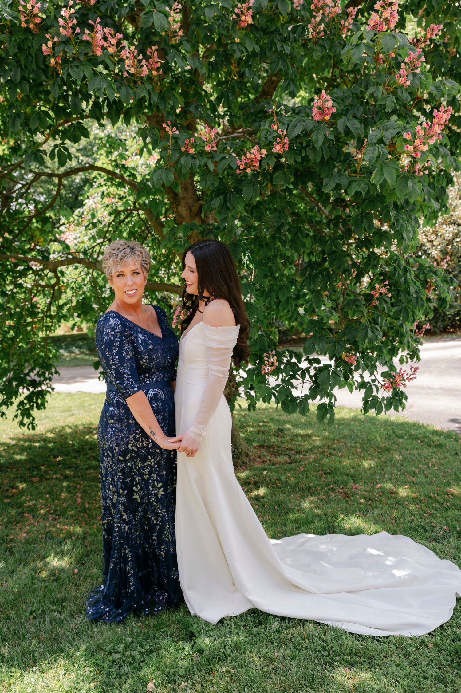 Bride and her mother sharing a quiet moment while getting ready on the wedding day at Village View Farm in Lexington, KY.