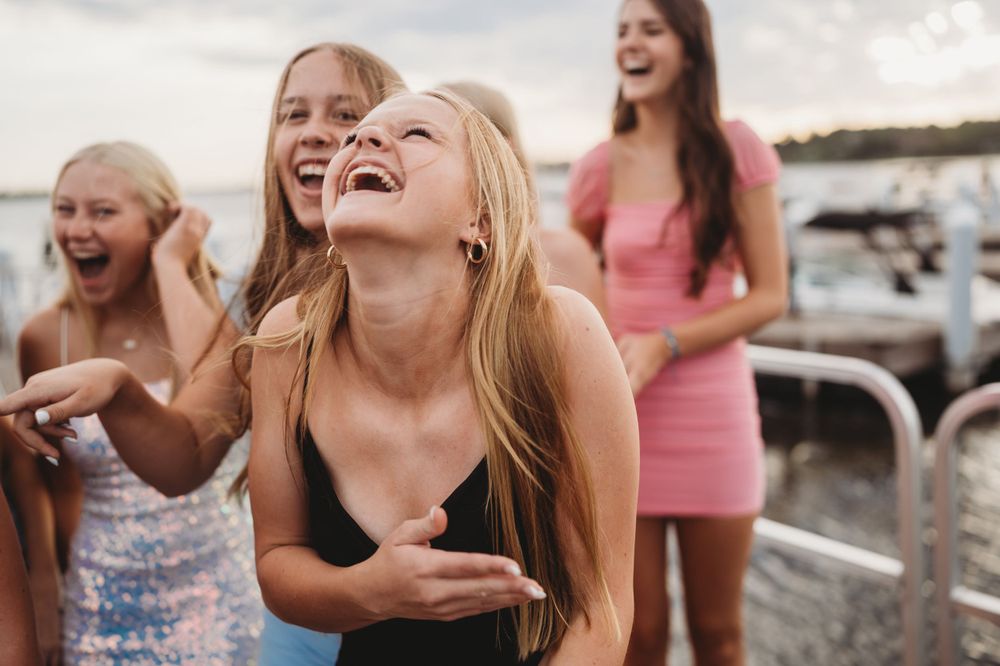Group of friends caught in a moment of authentic laughter and joy.