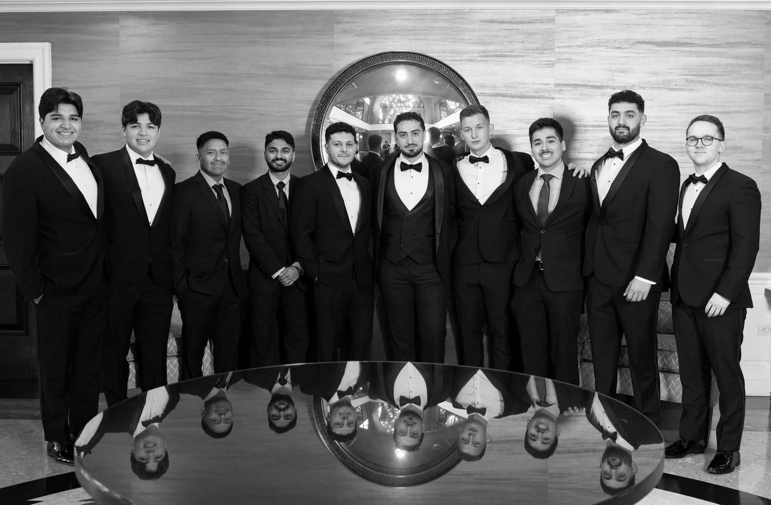 Black and white portrait of groom and groomsmen at Glen Island Harbour Club wedding.