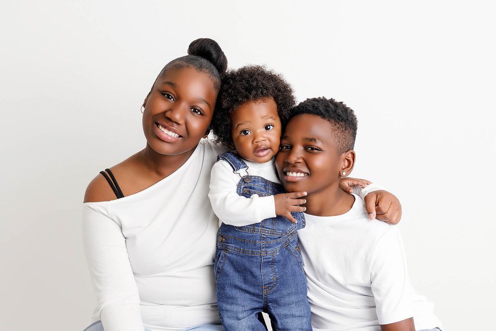 Three siblings by Moreno Valley baby photographer.