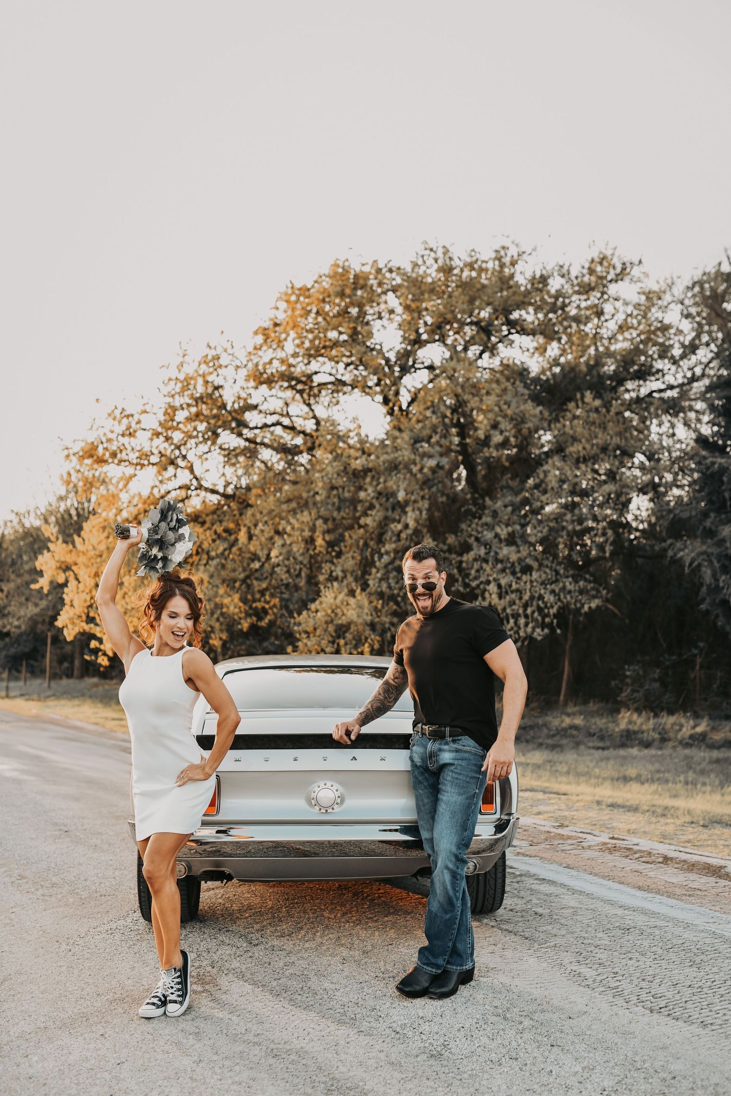 stylish engagement session with leather jacket groom and glam bride