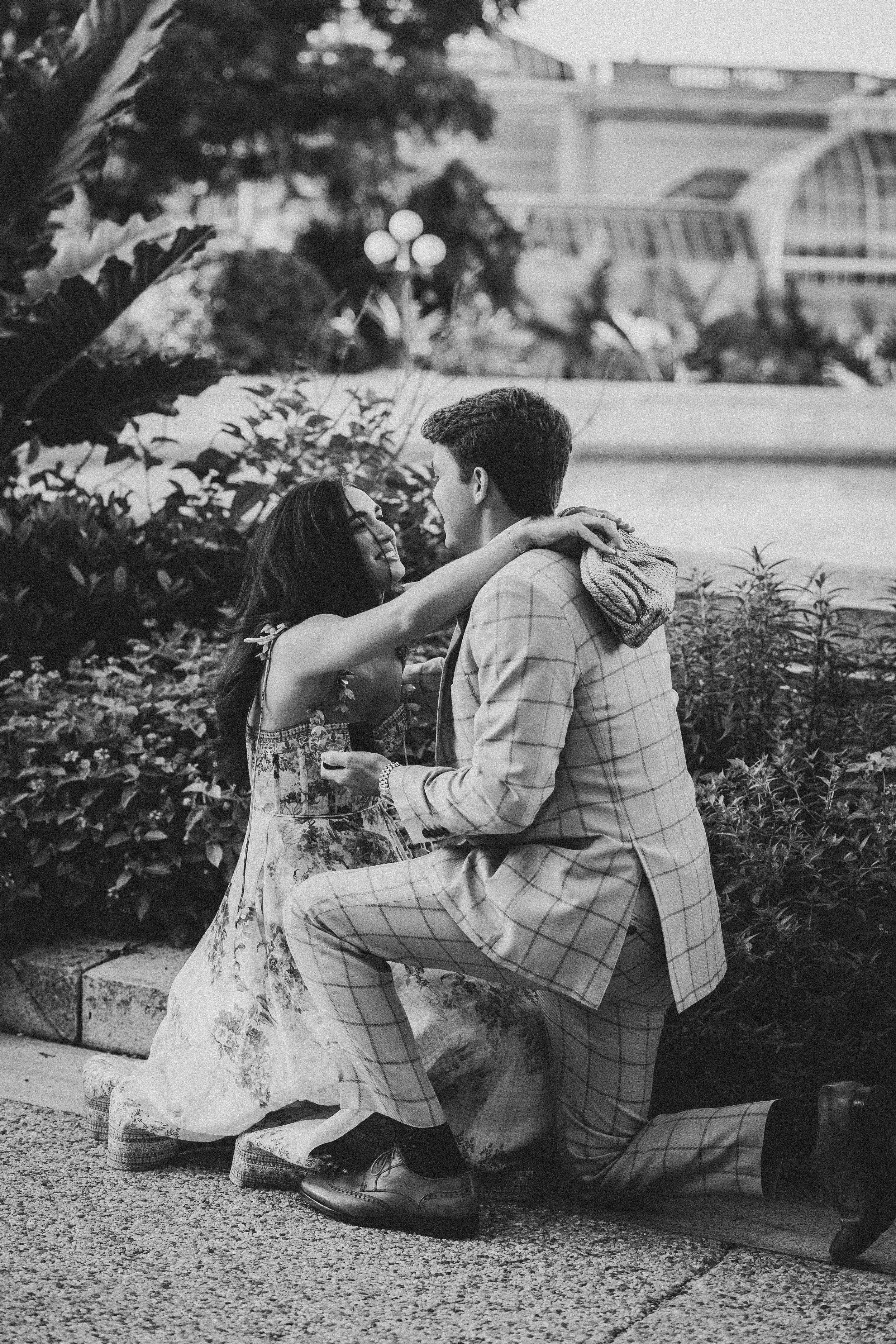 Quiet moment captured as couple embraces near the historic Bartholdi Fountain