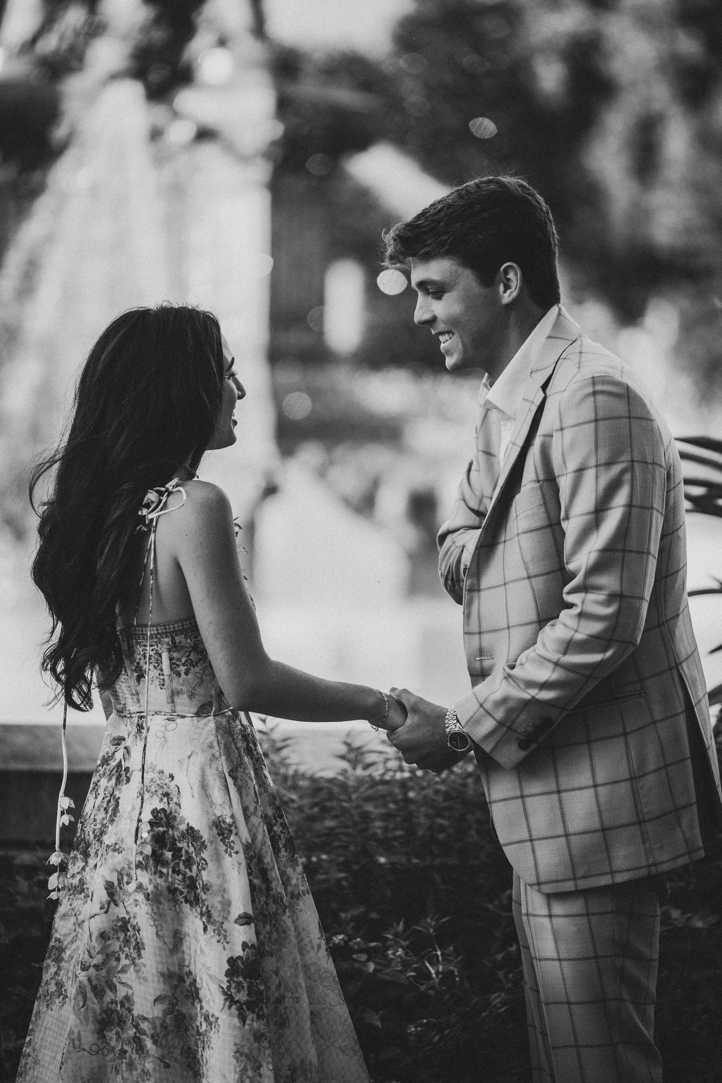 Golden hour lighting shining on the couple in front of ornate Bartholdi Fountain