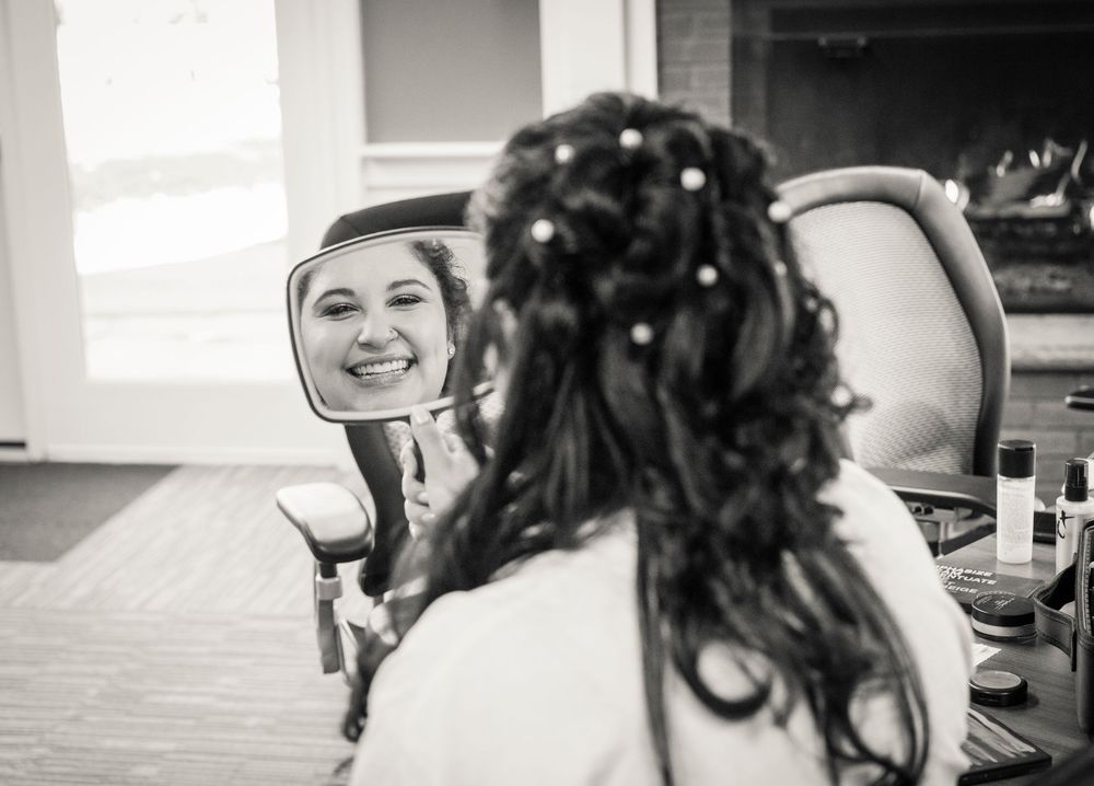 Black and white photo sequence of a couple dancing together during their wedding celebration.