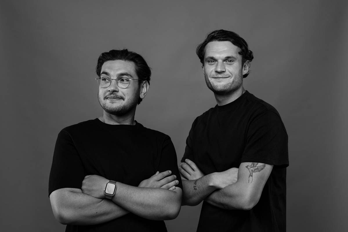 Two Hampshire-based CEOs pose for a portrait during their business brand photoshoot.