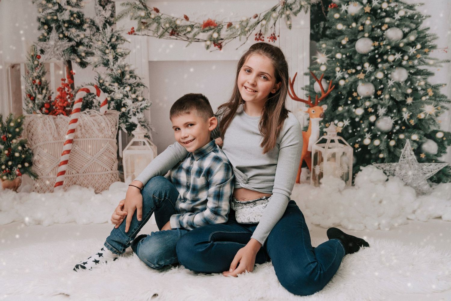 A series of winter holiday photos with festive Christmas trees and snowy decor in a cozy studio setting.