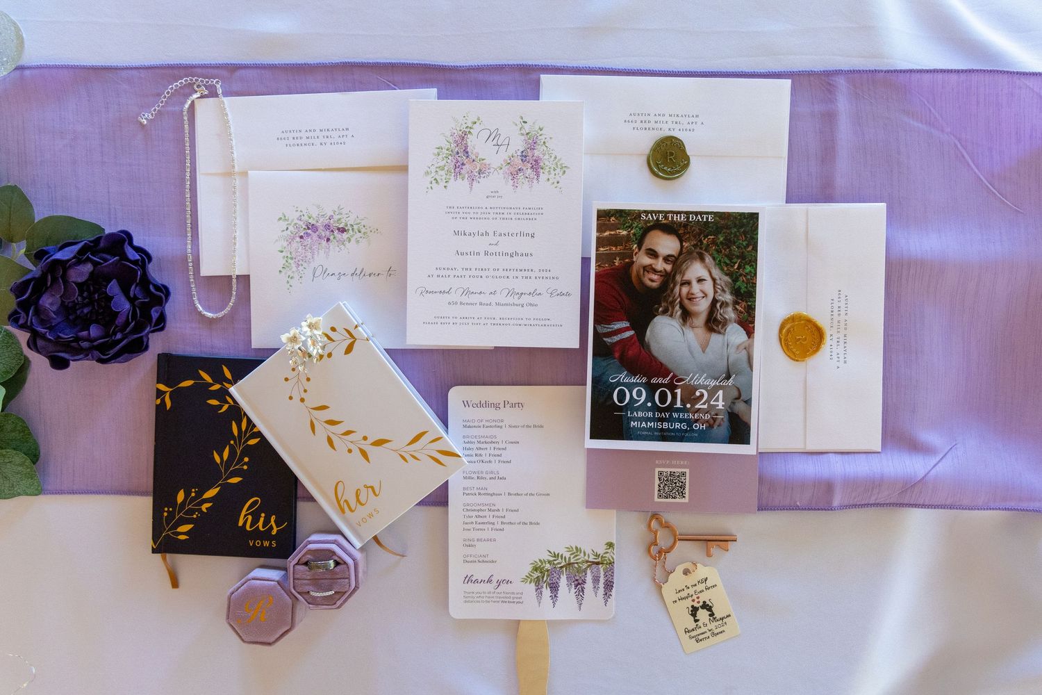 A collection of wedding invitations and paper goods displayed in a horizontal layout. Dayton Ohio wedding.
