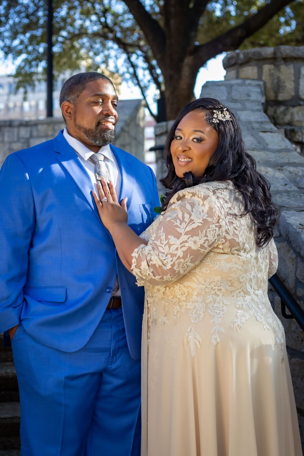A romantic wedding moment captured in a series of four photos showing a couple in blue suit and cream dress outdoors.