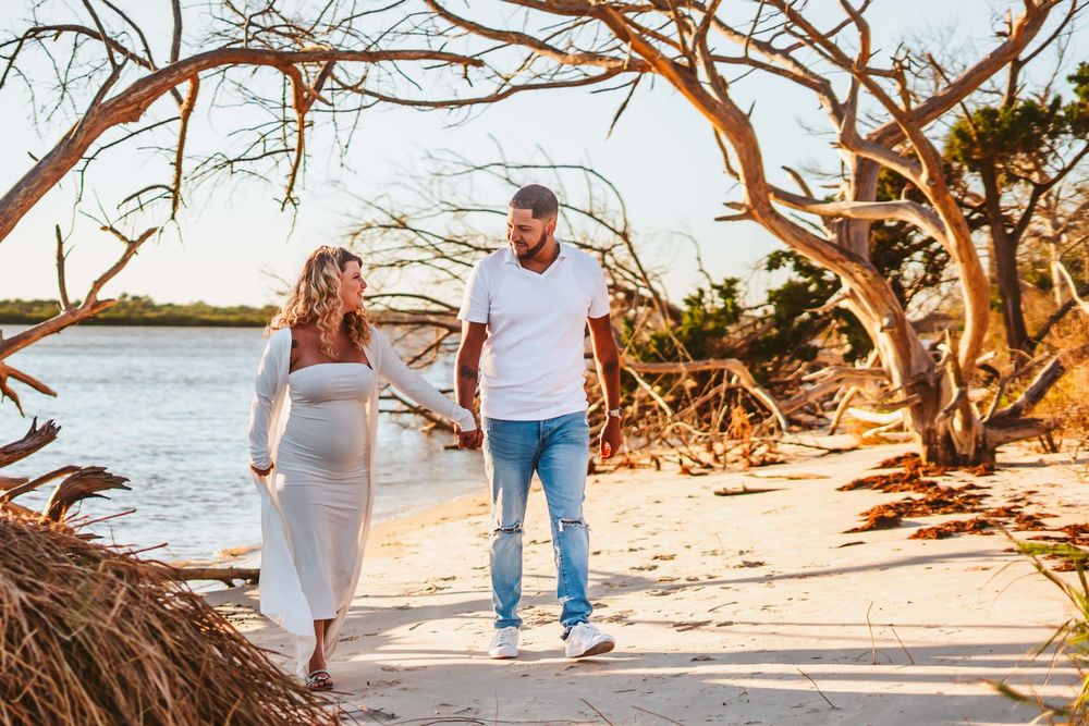 Photoshoot at Matanzas Inlet Saint Augustine Florida. Driftwood beach couples photography.