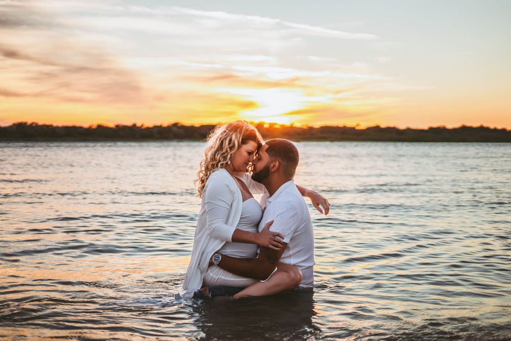 Photoshoot at Matanzas Inlet Saint Augustine Florida. Romantic and intimate couples photography in the water.