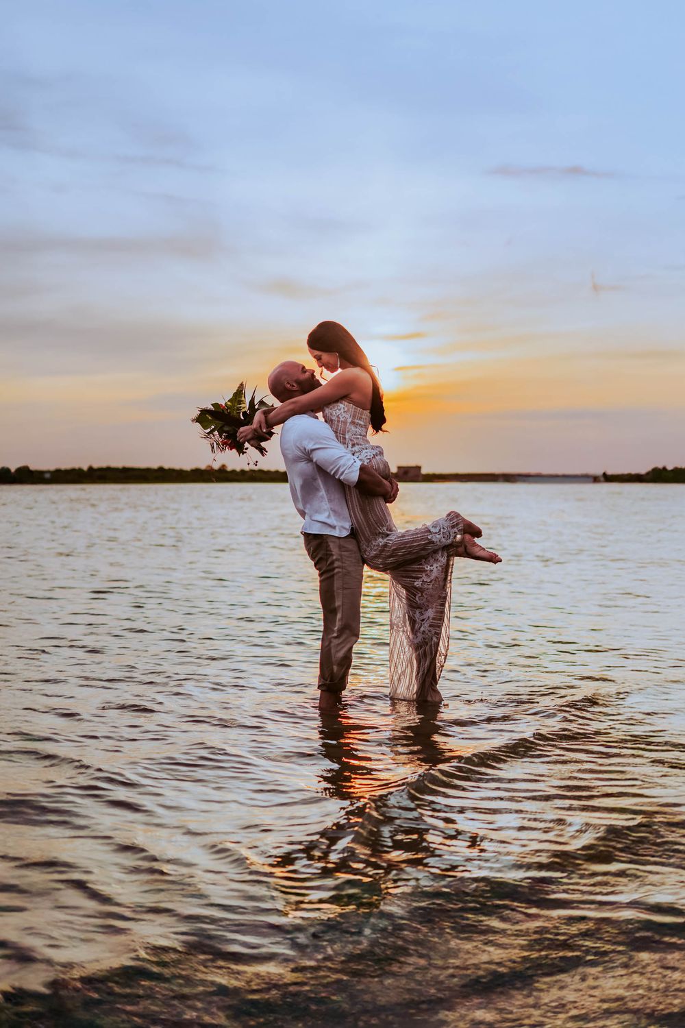 Photoshoot at Matanzas Inlet Saint Augustine Florida. Couples photography in the water. Trash the dress.