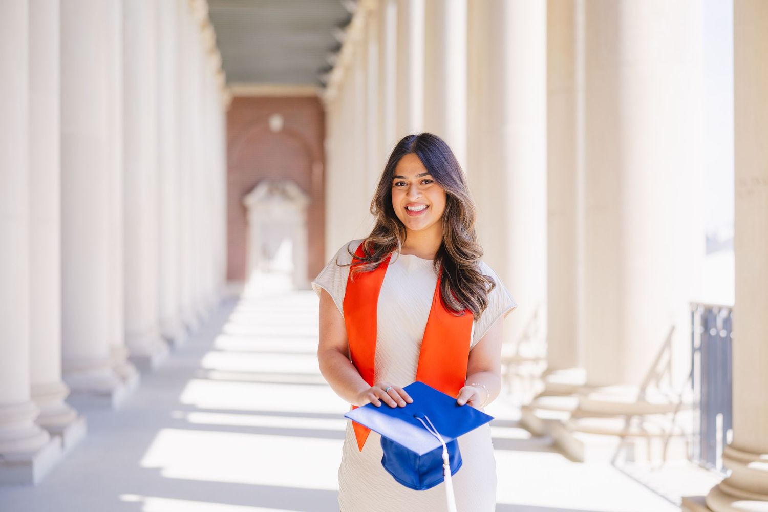 UIUC Memorial Stadium graduation photo at the pillars