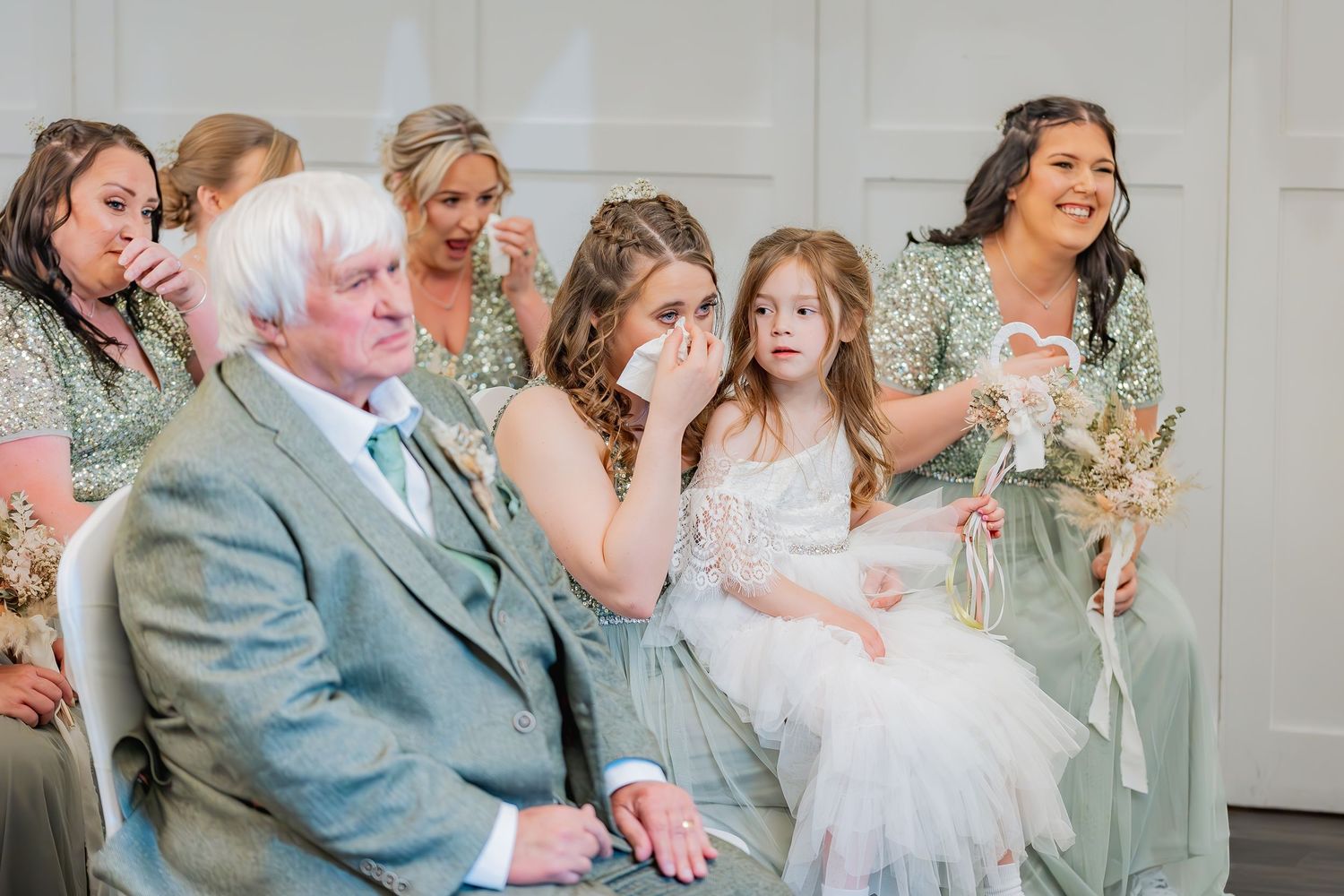 Natural guest moments during ceremony.