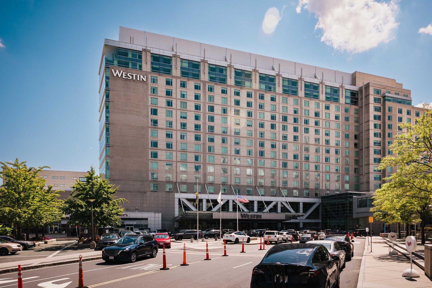 Westin Boston Seaport District hotel exterior where the bride and groom prepared for their Boston wedding