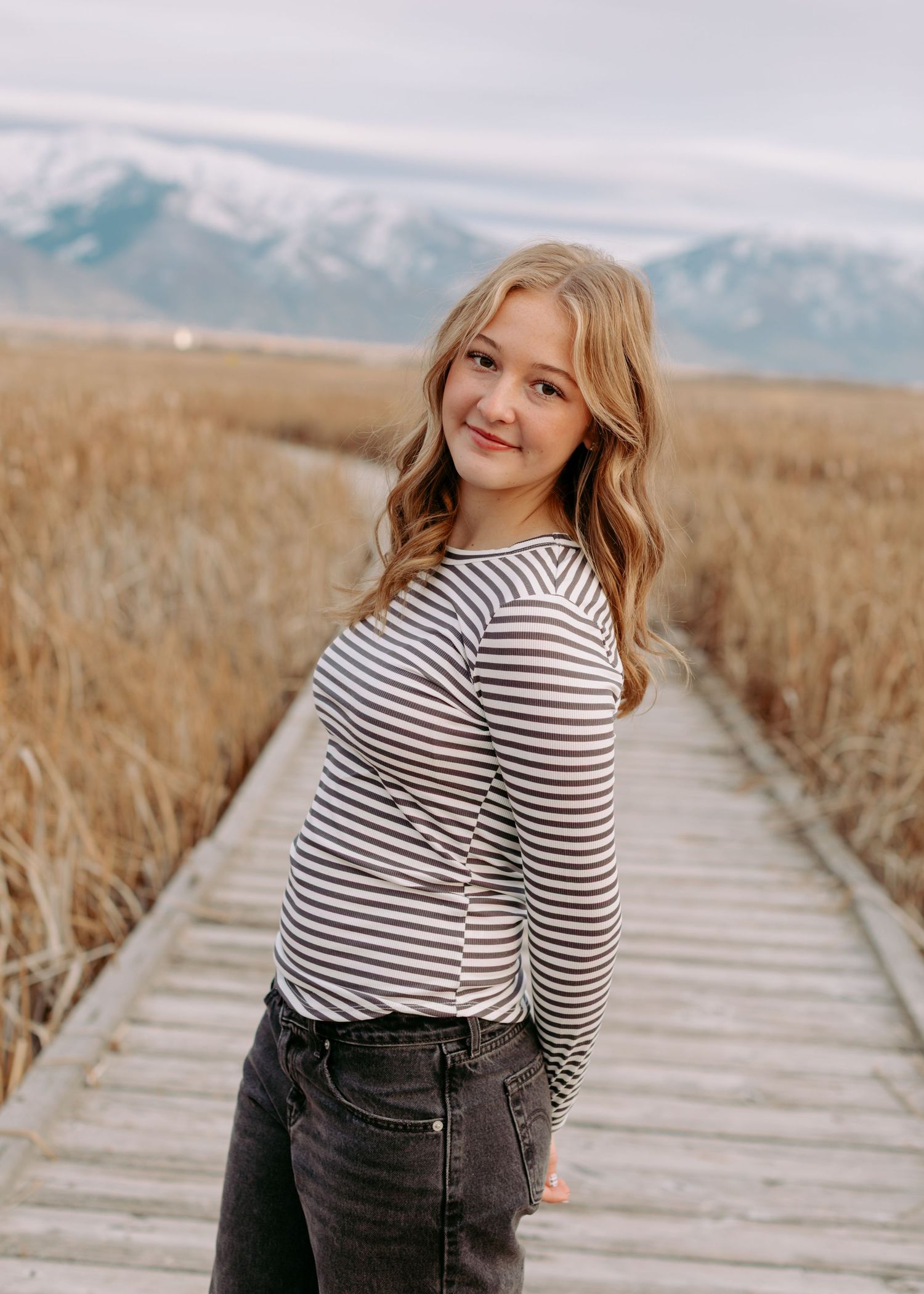 Senior photo session in Utah in a fun field.