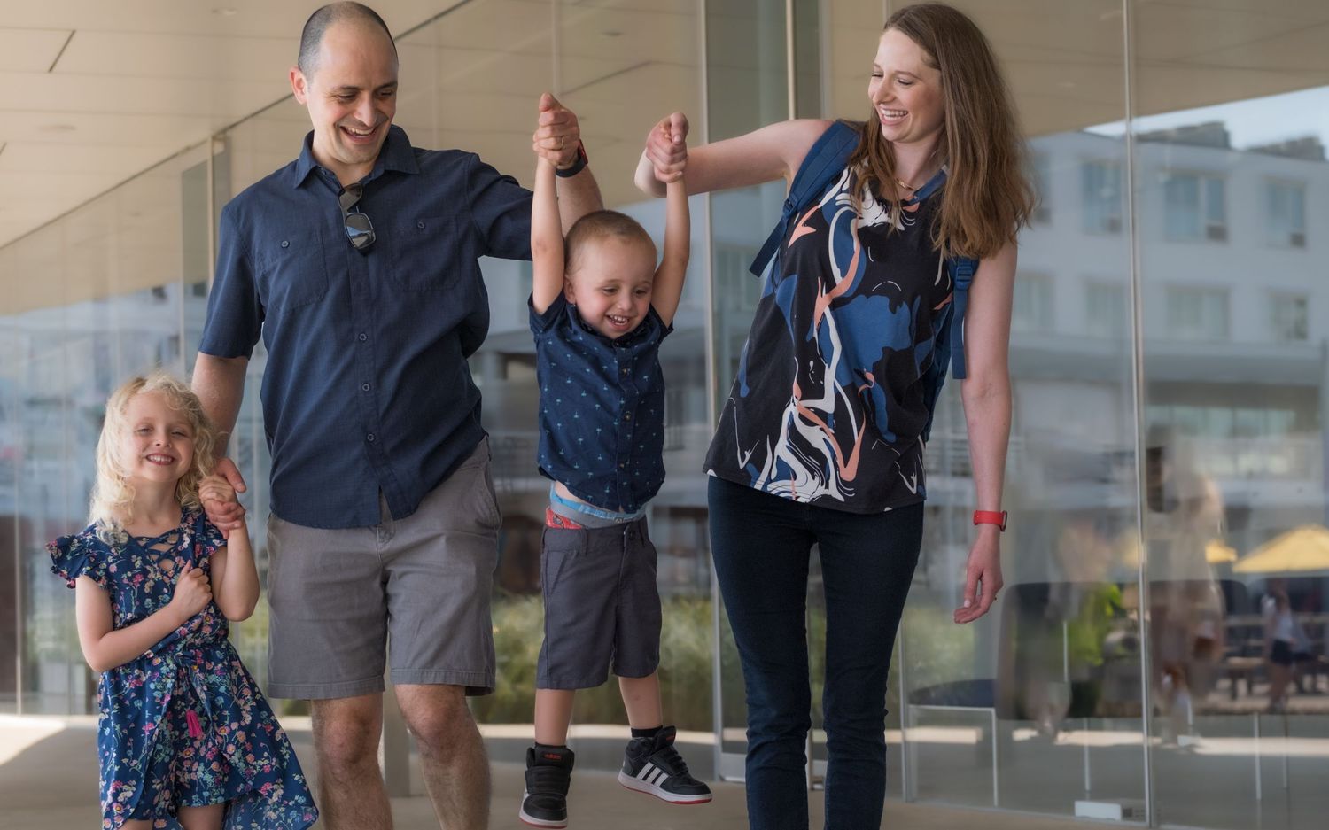 colour photo from fun family photo session outside Polygon Gallery at The Shipyards North Vancouver
