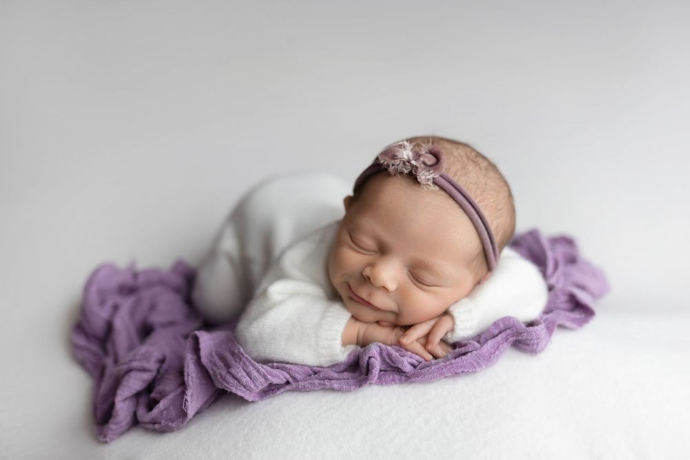 Newborn baby on white background, taken by Jen Knightstep, Photographer