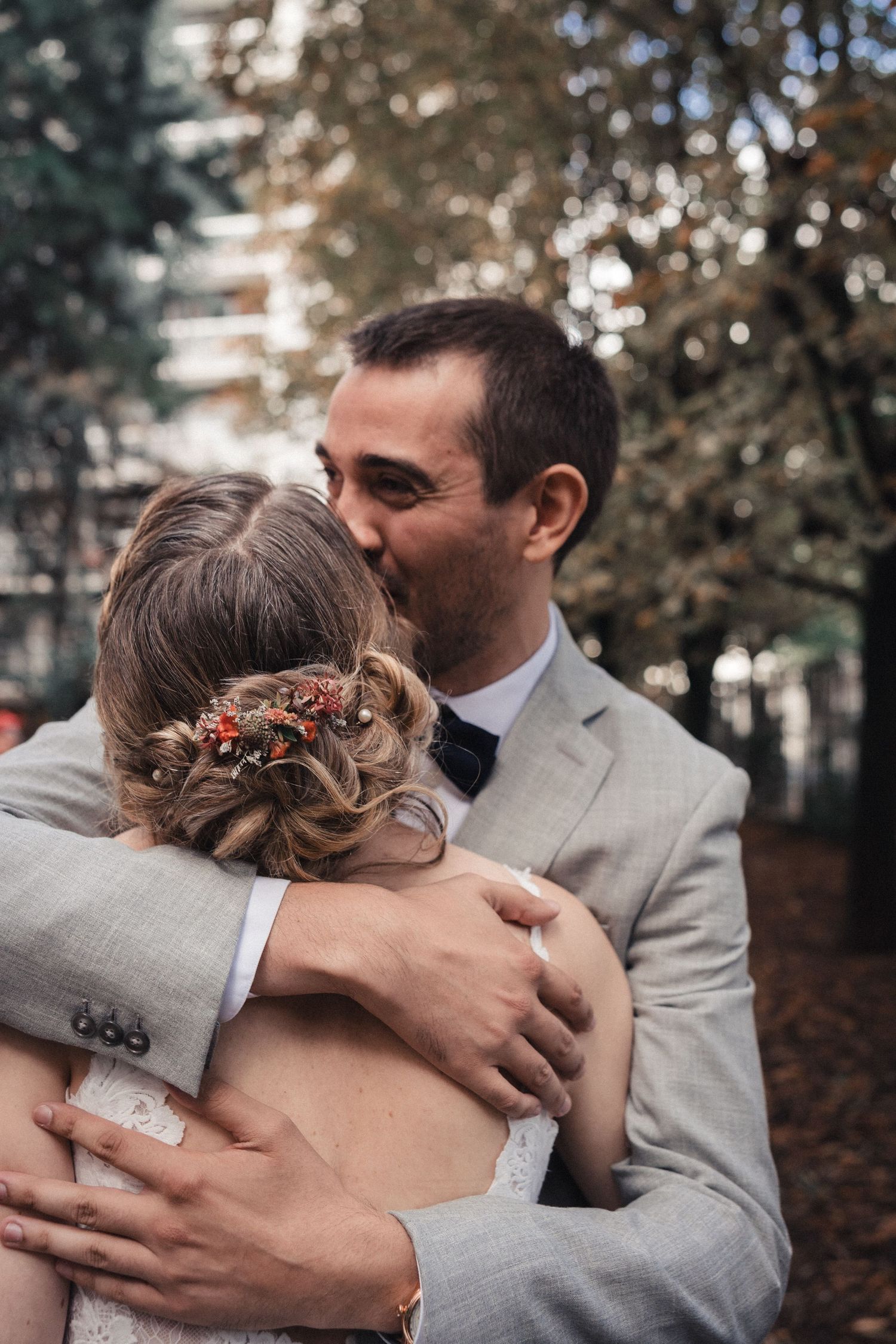 Tender wedding moment captured in sequence showing couple embracing outdoors.