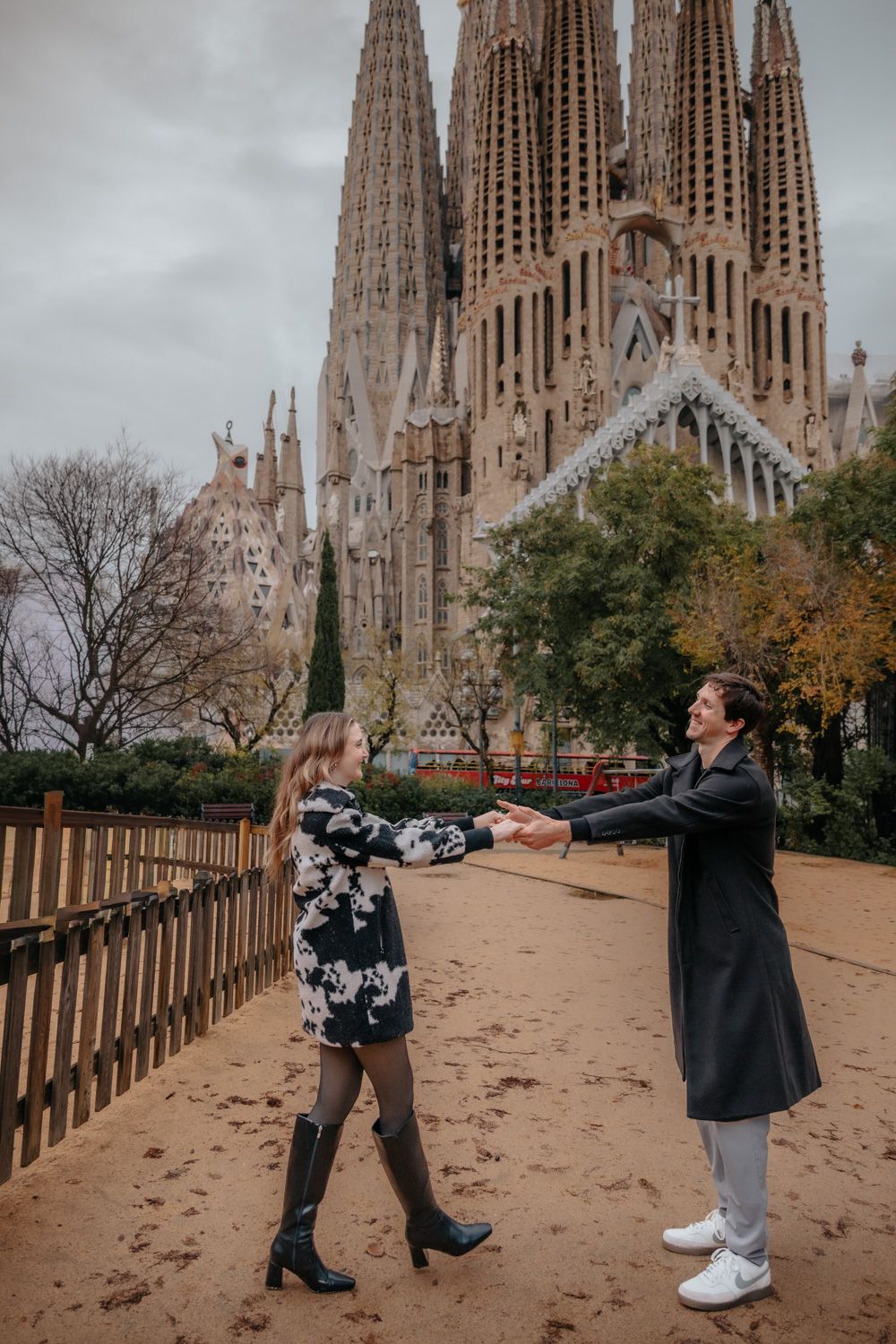Joyful couple walking under trees Passeig de Gaudi Anniversary photoshoot Barcelona BarcelonaLoversPH