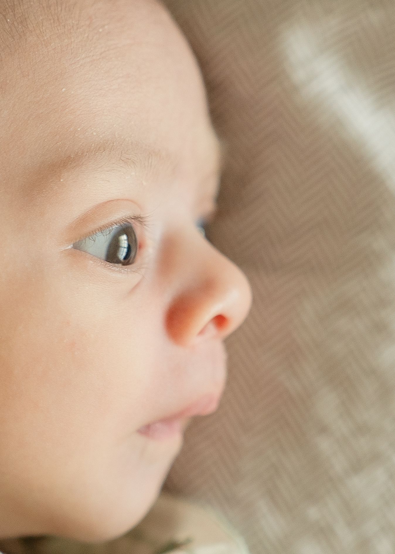 Cozy nursery newborn photos captured in Houston in-home photography session