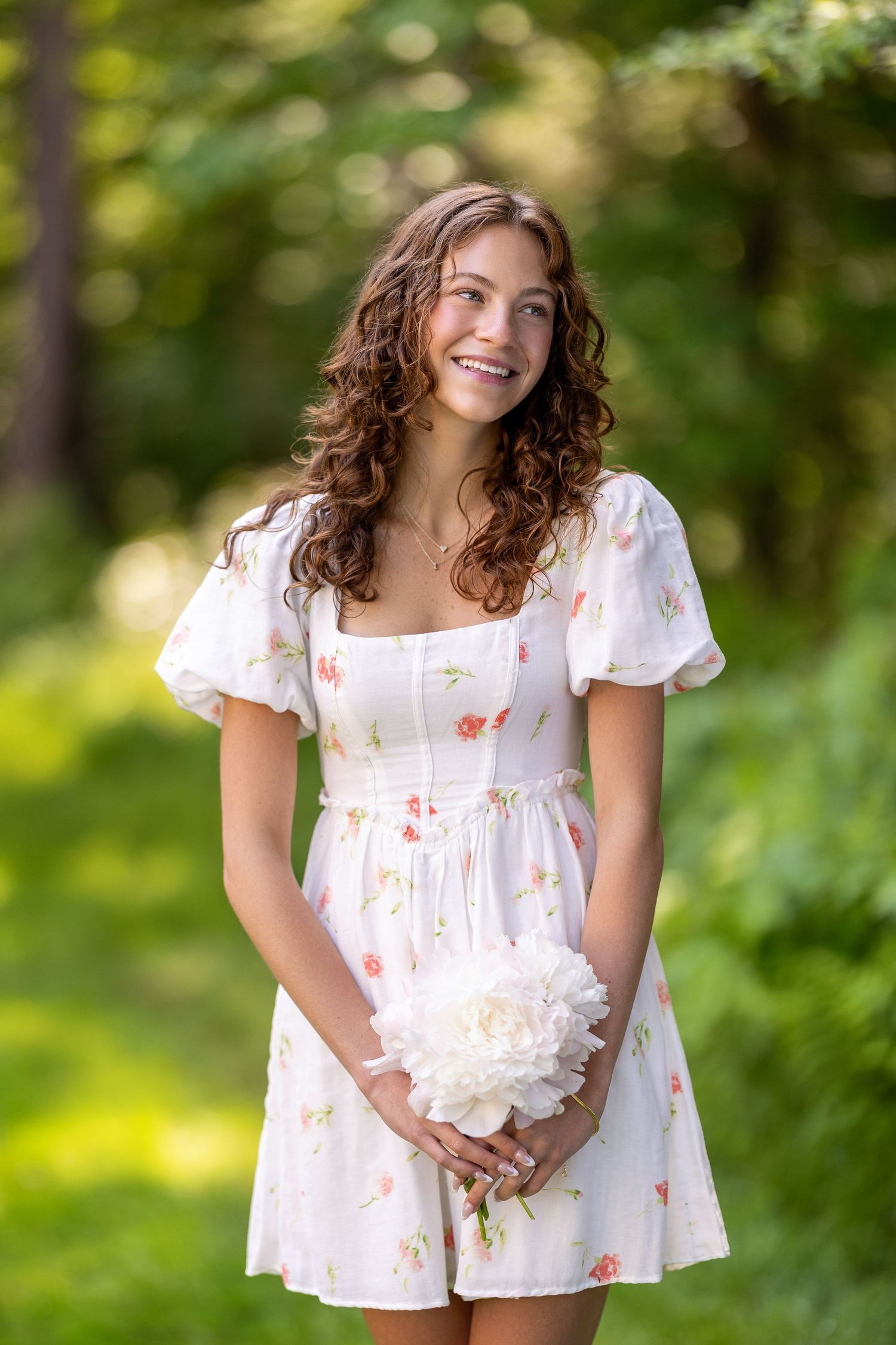 High School Senior Portrait with flowers, natural background, Exeter, New Hampshire