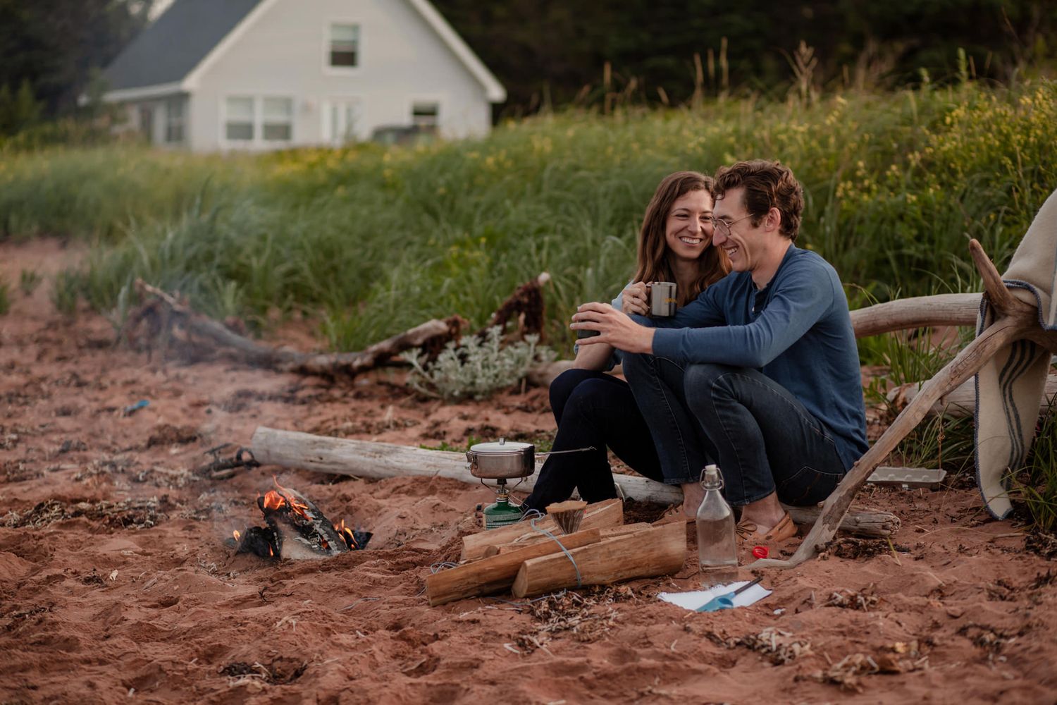 Dude-Approved Couples Photoshoot Ideas near Kingston On (That Don’t Feel Awkward or Staged) campfire on the beach