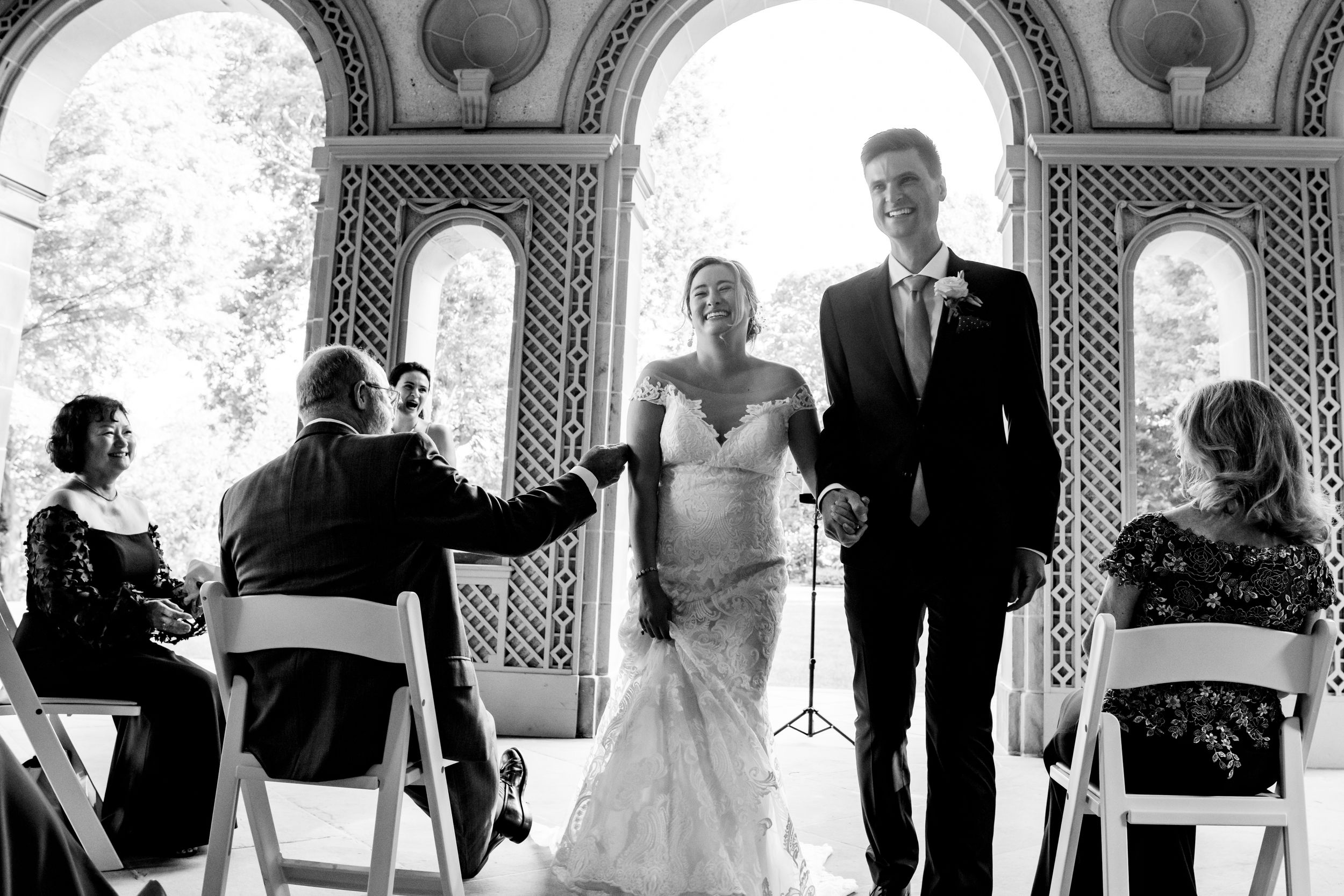 Romantic garden wedding at Glen Manor House. Waterfront estate photography in Portsmouth, RI capturing authentic moments by Stefy Hilmer.