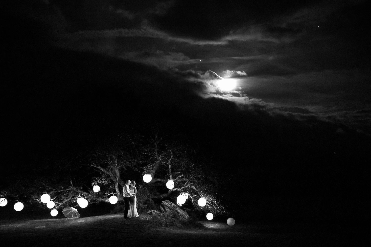 wedding couple dancing in the moonlight on their wedding night in vermont