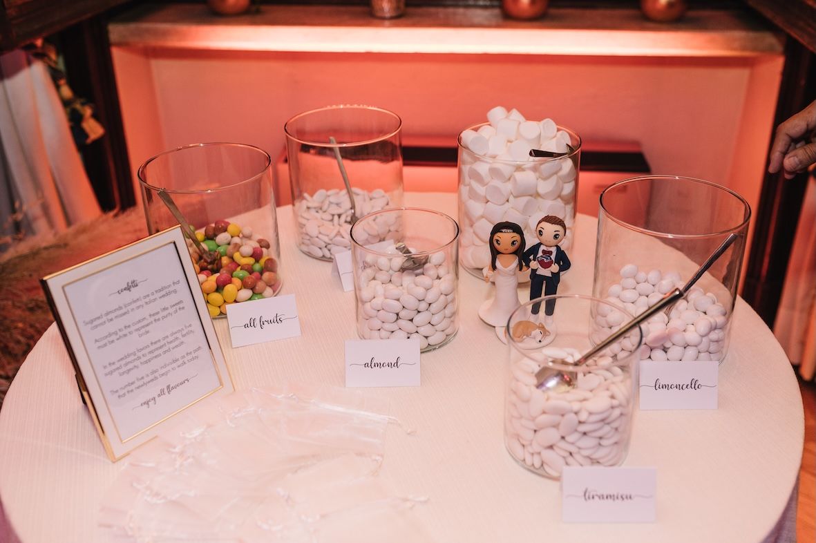 Traditional Italian confetti table at Lake Iseo villa wedding reception
