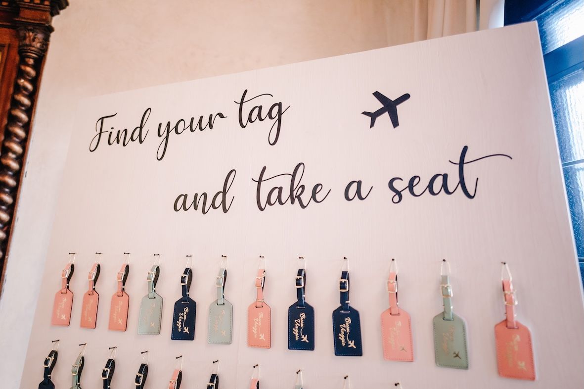 Table plan with luggage tags at Lake Iseo Italian villa wedding
