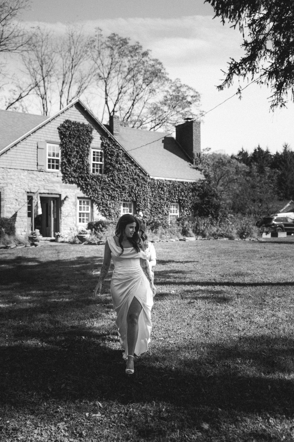 A sequence of black and white photos shows someone playing baseball in a backyard with a house in the background.