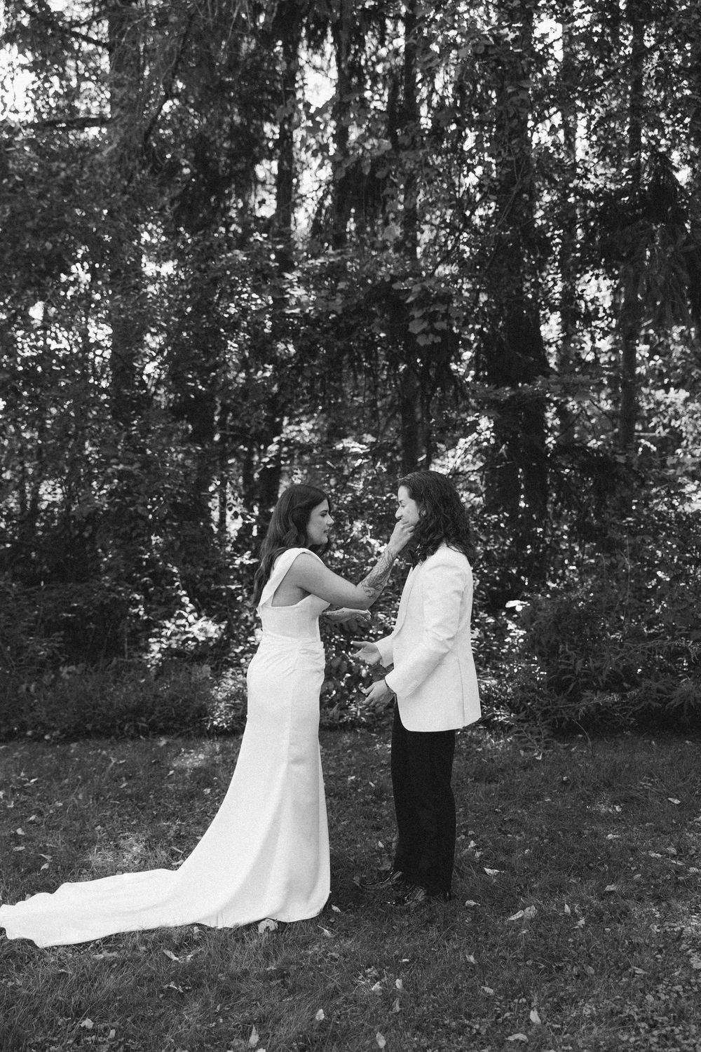 A series of black and white photos showing a couple in formal attire dancing playfully in a wooded outdoor setting.