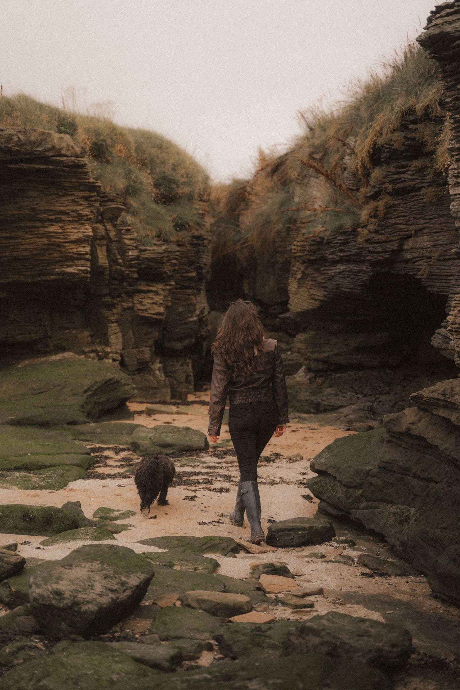Photographer exploring with dog at Hilbre Island in the Wirral