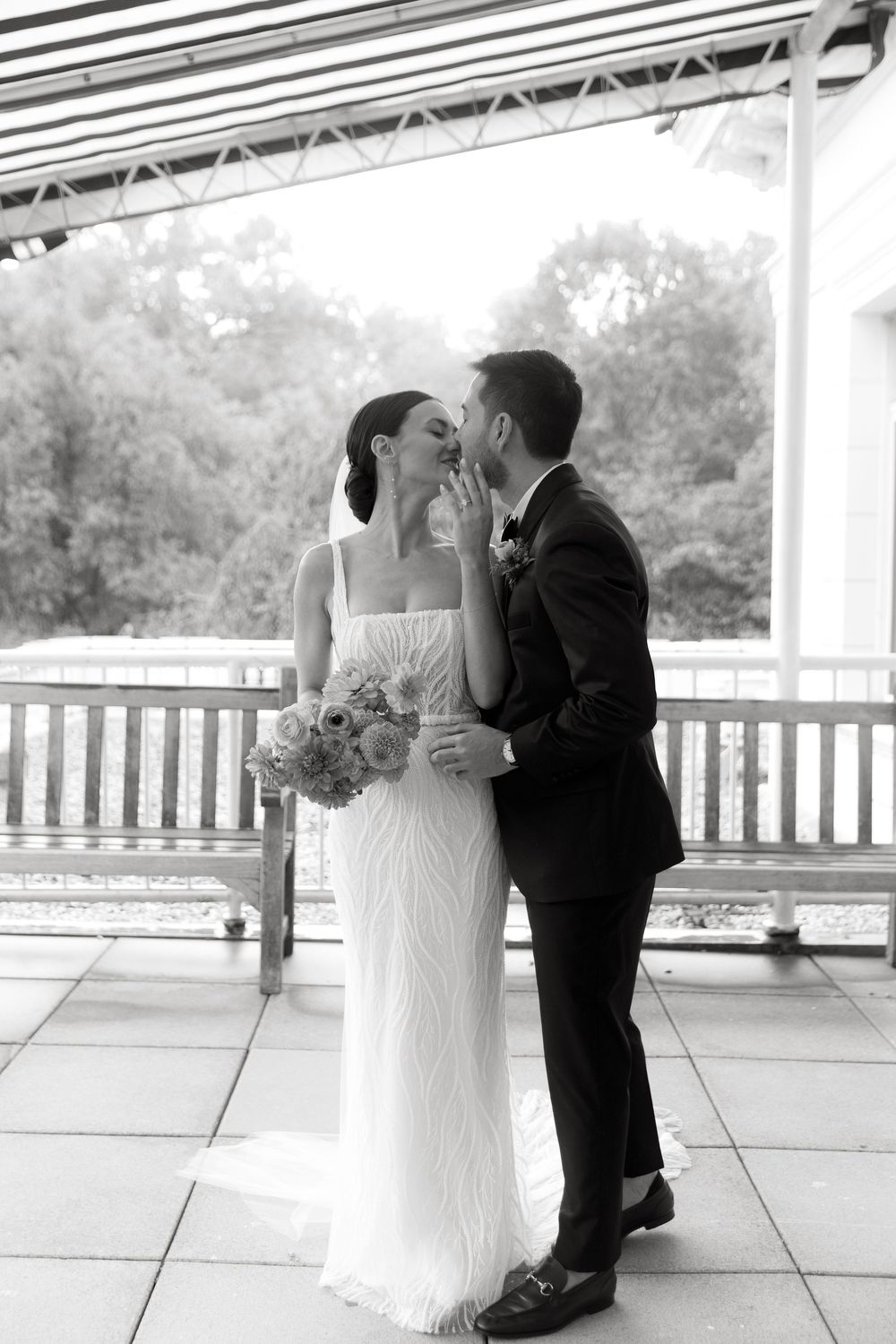Black and white sequence of tender wedding moments shared on an elegant covered porch.