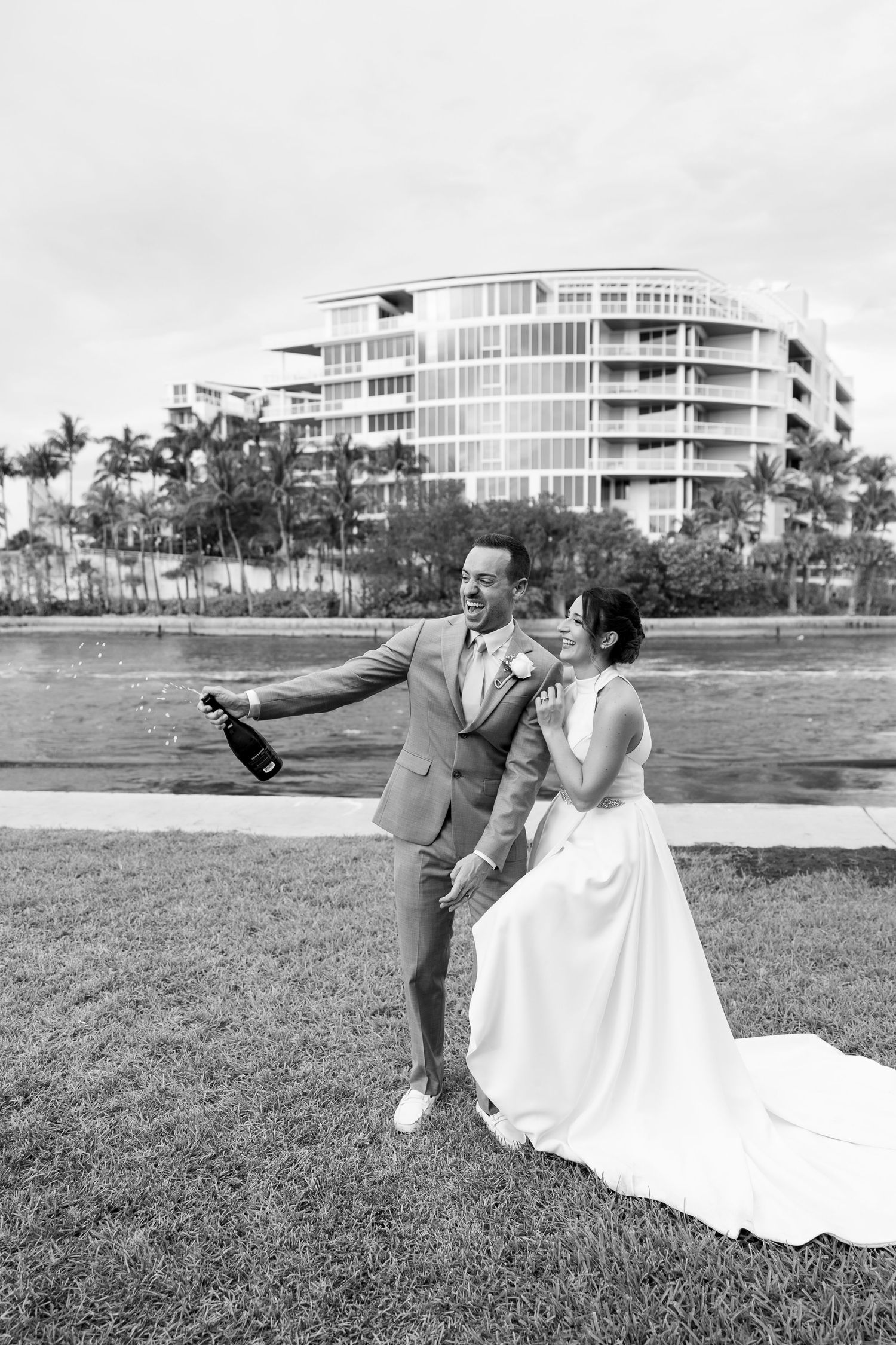 Intimate boca elopement with close family and friends. Couple portraits at he beach and marriage ceremony in front of intercoastal