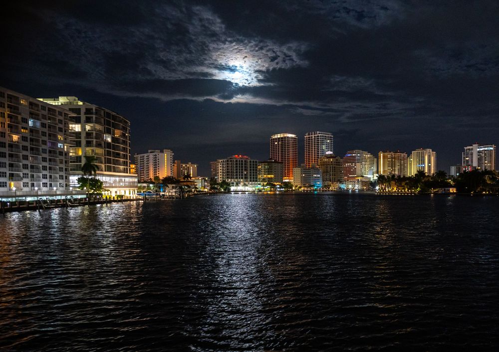 Guests dancing to live saxophone performance at South Florida wedding